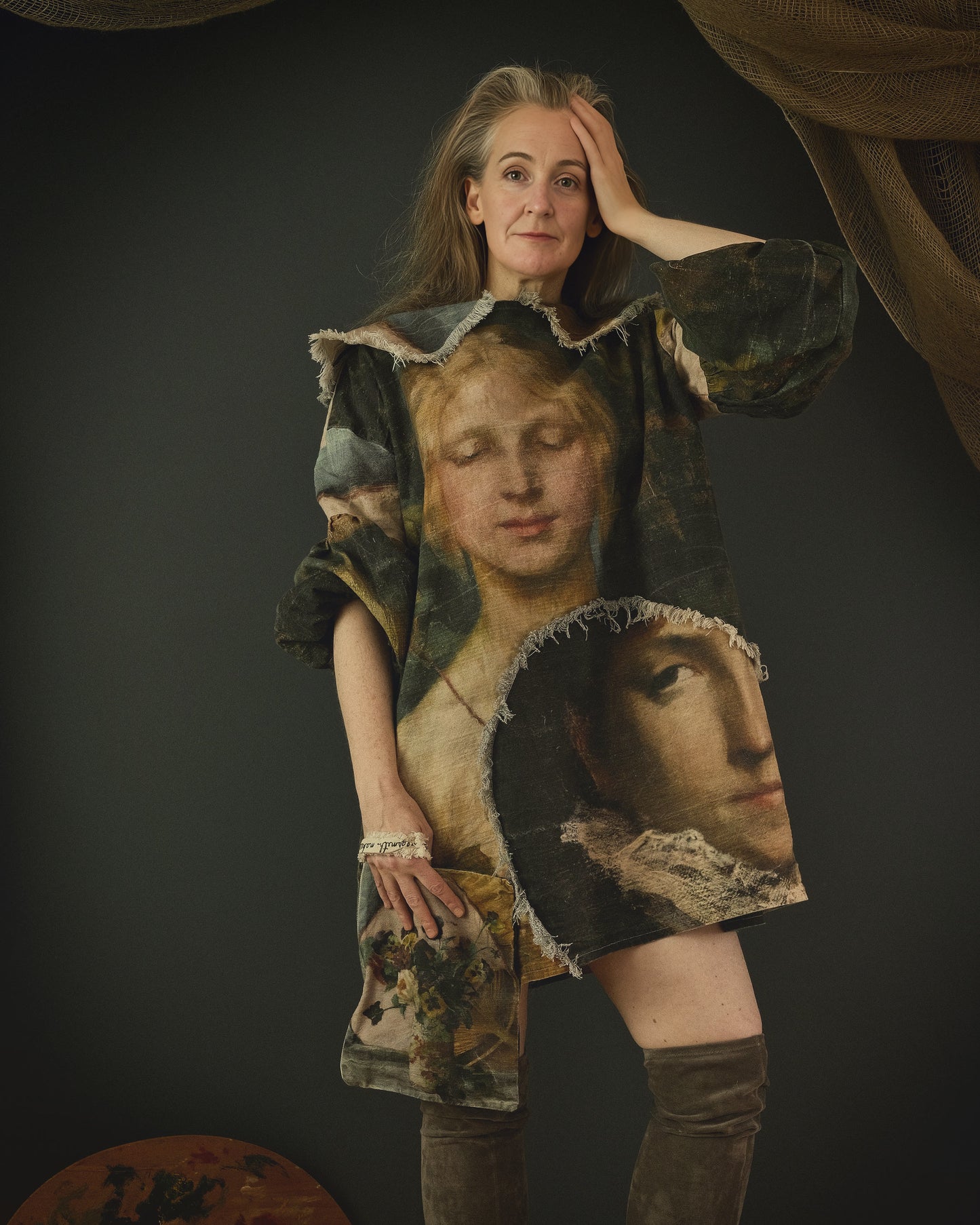 woman wearing cotton linen dress printed in bold 19th century artwork