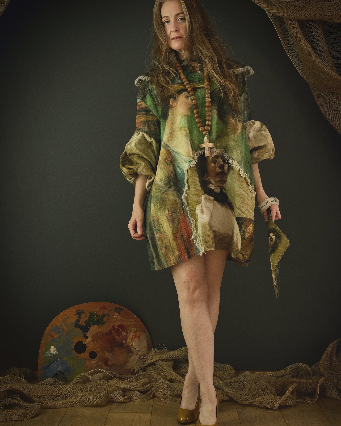 woman wearing a cotton linen dress with bold 19th century artwork print