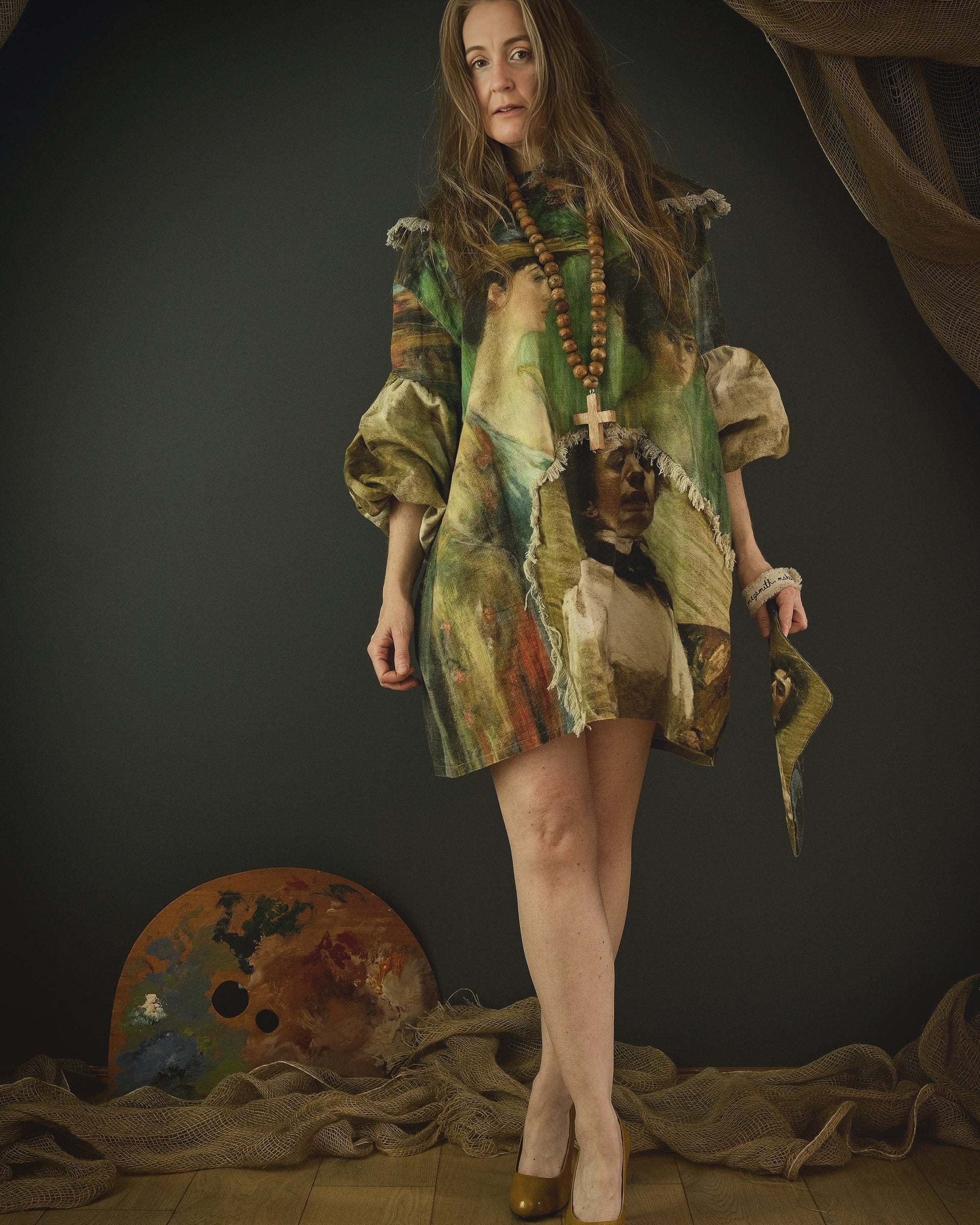 woman wearing a cotton linen dress with bold 19th century artwork print