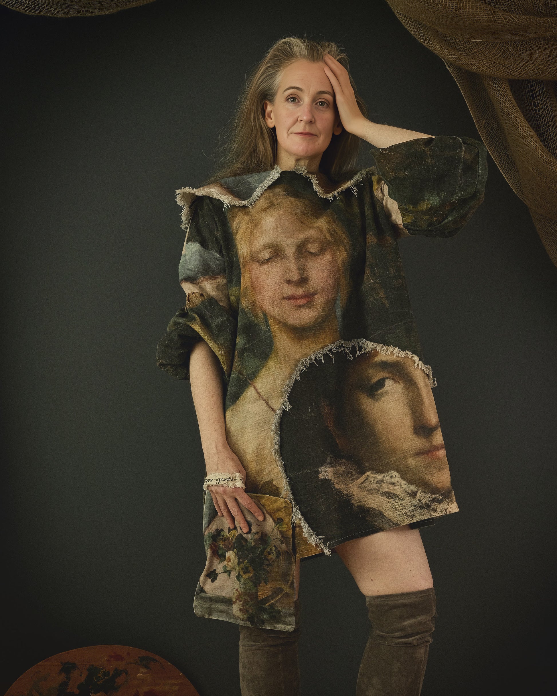 woman wearing cotton linen dress printed in bold 19th century artwork