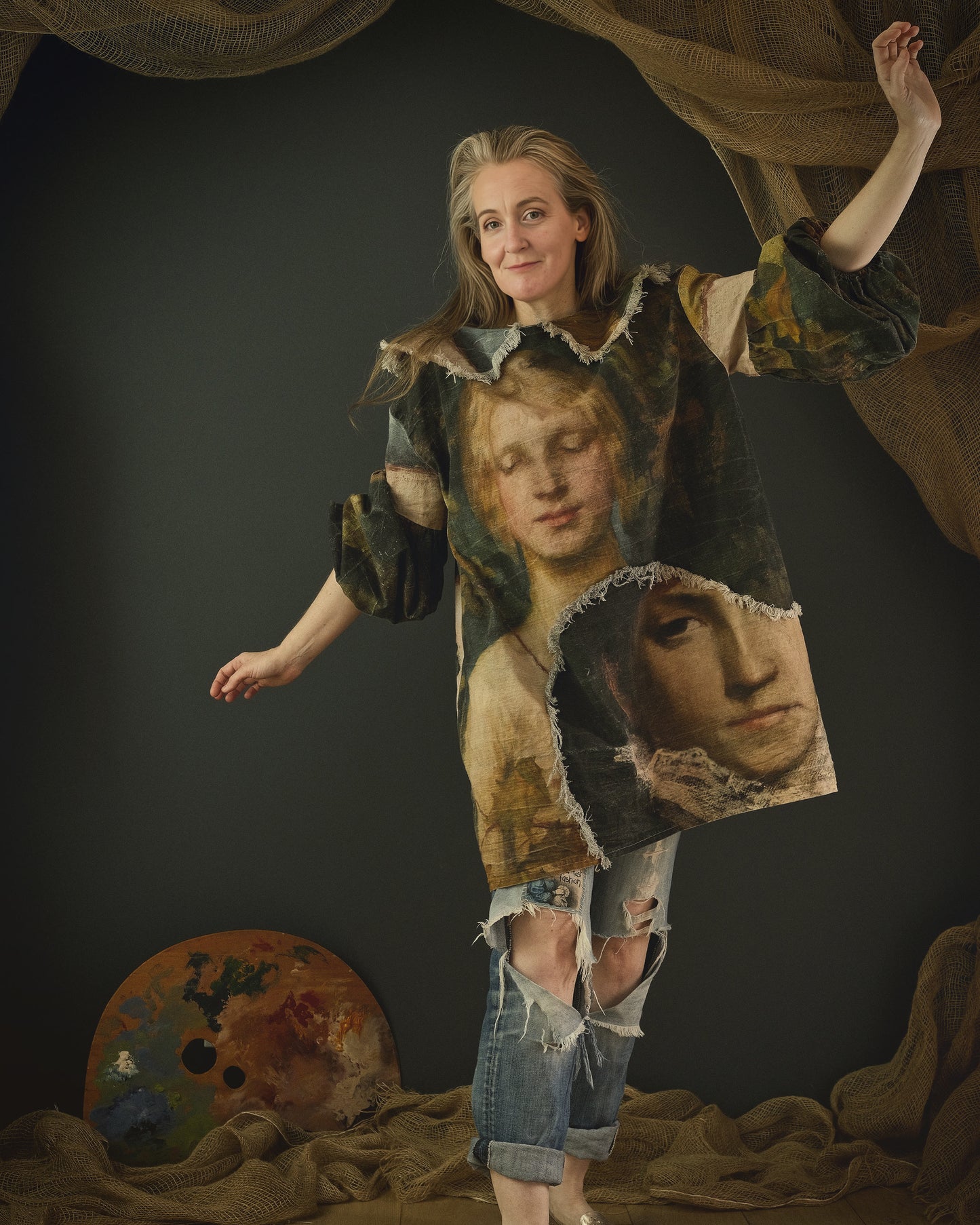 woman wearing cotton linen dress printed in bold 19th century artwork